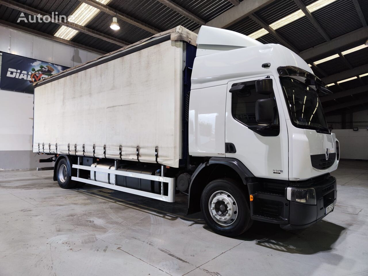 Renault Premium 320 camión con lona corredera