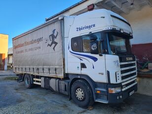 Scania R 124 420 camión con lona corredera